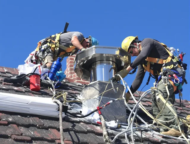 Protective chimney cap installed by Lakeville Chimney Sweep in Lakeville, MA
