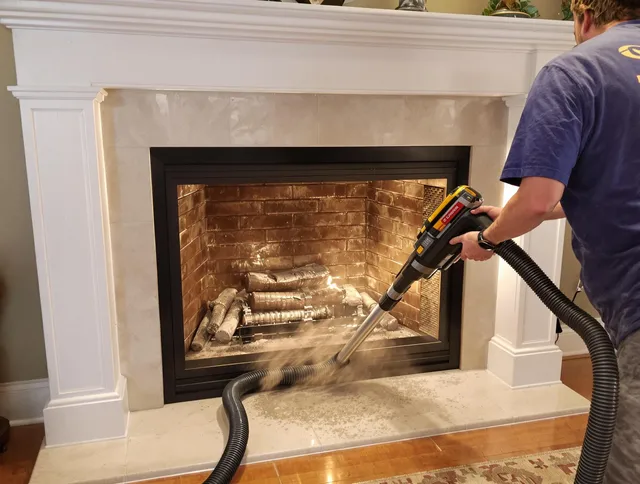 Fireplace cleaning performed by Lakeville Chimney Sweep in Lakeville, MA