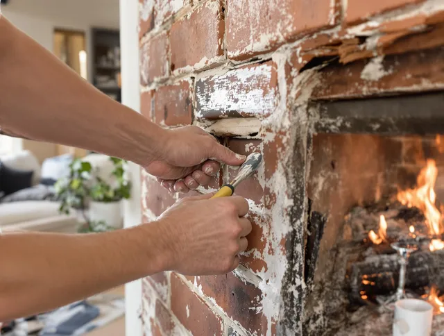 Routine fireplace repair by Lakeville Chimney Sweep in Lakeville, MA